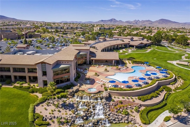 drone / aerial view with a residential view and a mountain view