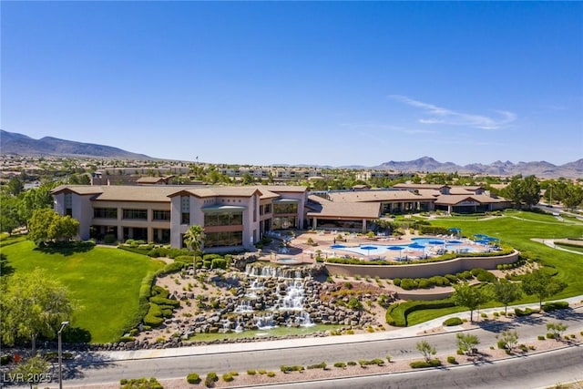 drone / aerial view with a residential view and a mountain view