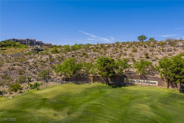 view of yard with view of golf course