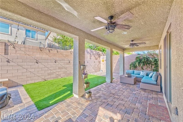 view of patio / terrace with outdoor lounge area and ceiling fan