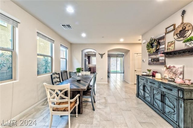 dining space with plenty of natural light