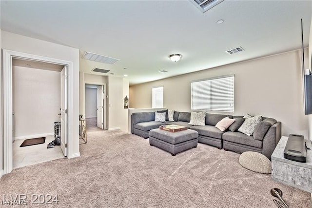 living room featuring light colored carpet