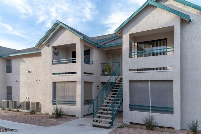 view of building exterior featuring central air condition unit