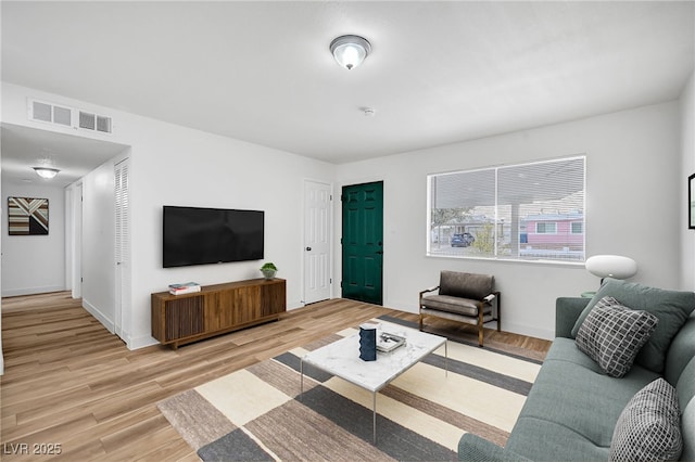 living room with hardwood / wood-style floors