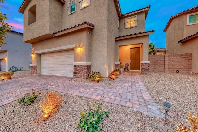 view of front of home featuring a garage