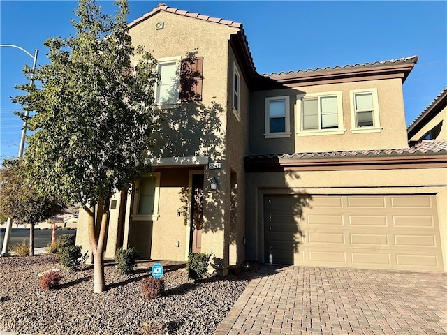 view of front of property featuring a garage