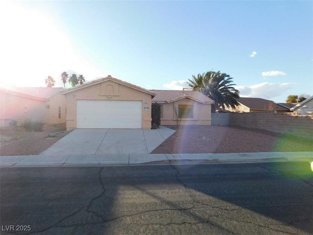 view of front of property featuring a garage