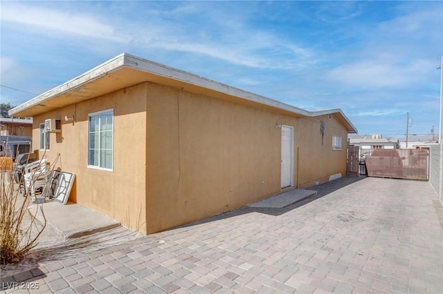 view of home's exterior featuring a patio area