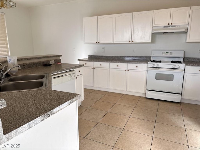 kitchen featuring white cabinetry, sink, white appliances, and light tile patterned floors