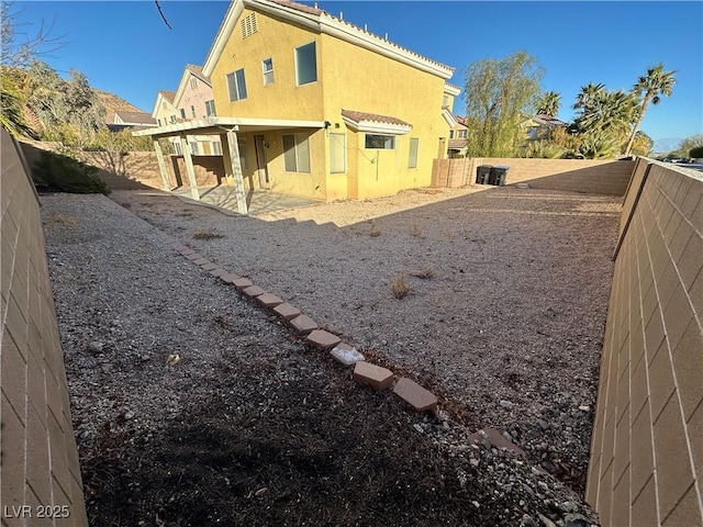 rear view of house with a patio area