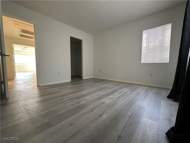 unfurnished bedroom featuring light hardwood / wood-style floors