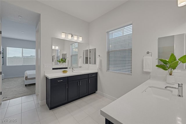 bathroom with vanity and tile patterned flooring