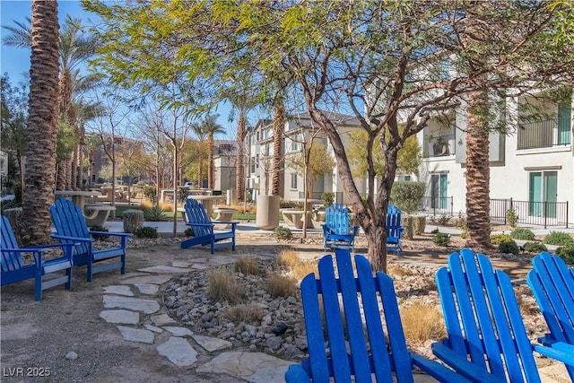 view of community featuring a residential view and a patio