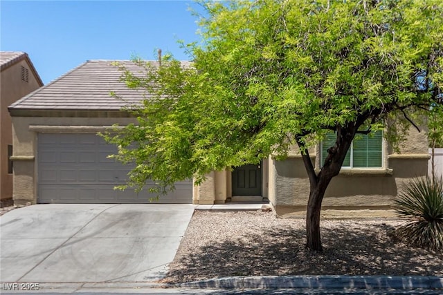 obstructed view of property featuring a garage