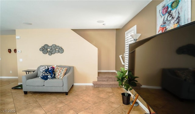 living area with light tile patterned floors