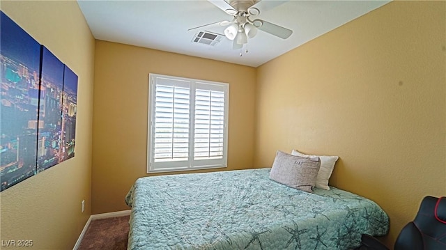 bedroom featuring ceiling fan and carpet flooring