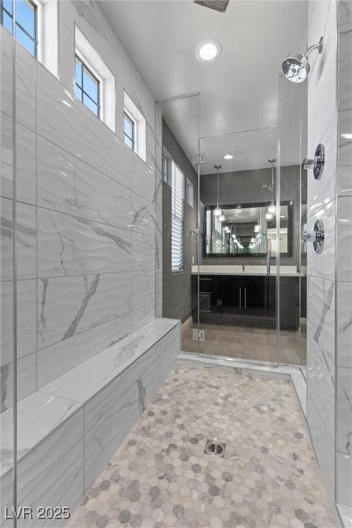 bathroom featuring an enclosed shower