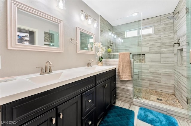 bathroom featuring vanity and walk in shower