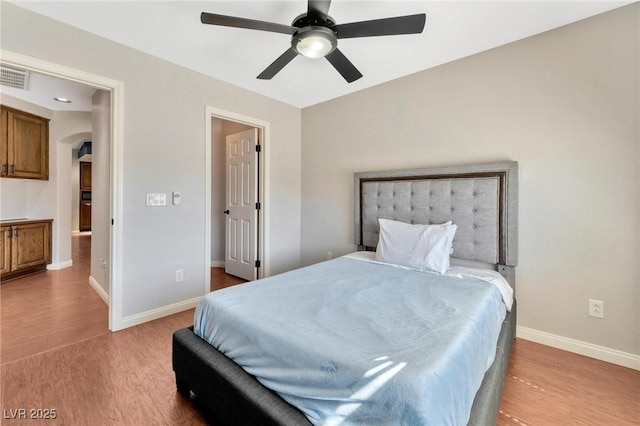 bedroom featuring ceiling fan and light wood-type flooring