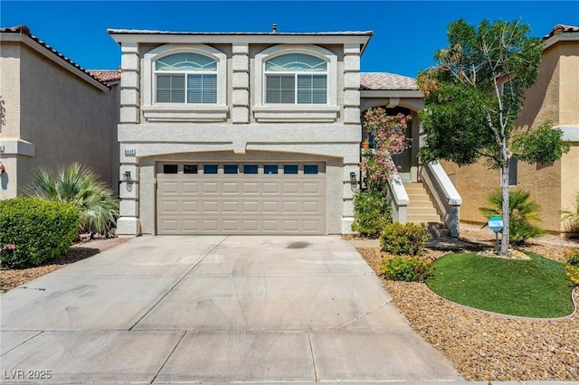 view of front of property featuring a garage