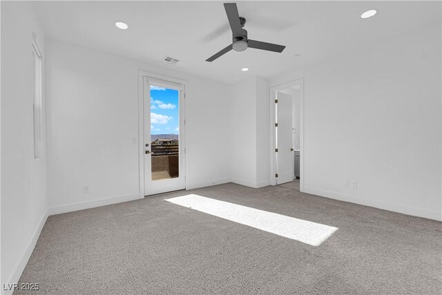 carpeted empty room with ceiling fan