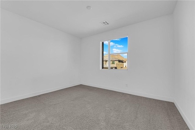 unfurnished room with carpet