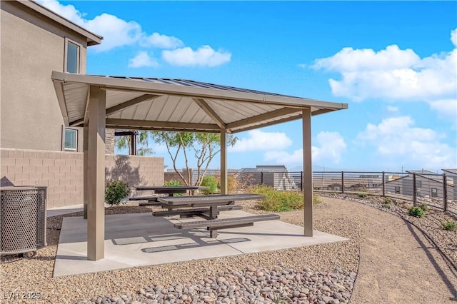 exterior space featuring a gazebo and central air condition unit