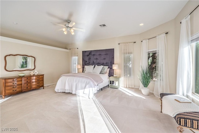 carpeted bedroom with ceiling fan