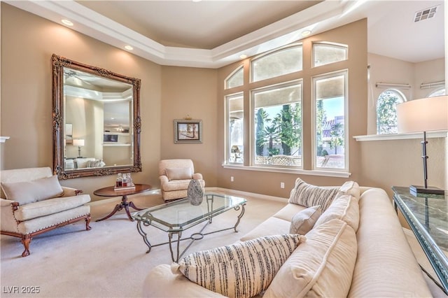 sitting room featuring light carpet