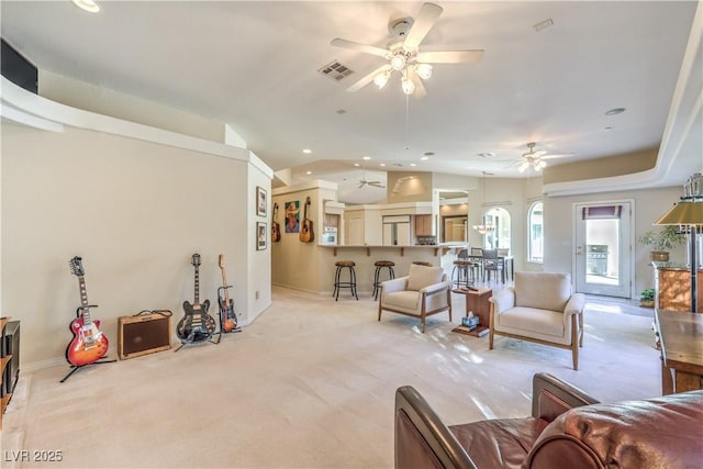 carpeted living room featuring lofted ceiling and ceiling fan