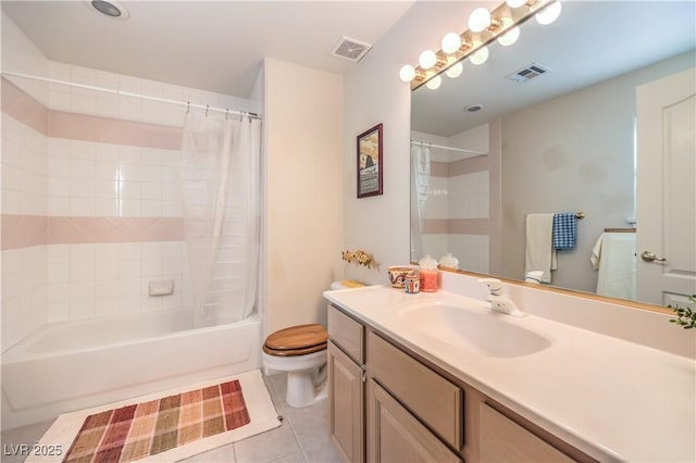 full bathroom with shower / tub combo with curtain, vanity, tile patterned floors, and toilet