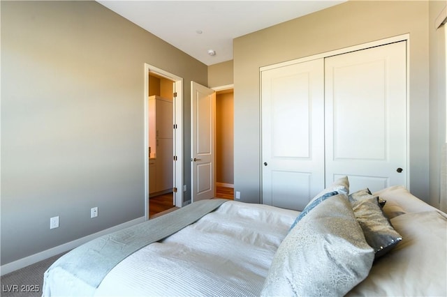 bedroom featuring carpet and a closet