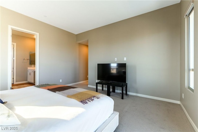 bedroom with light colored carpet