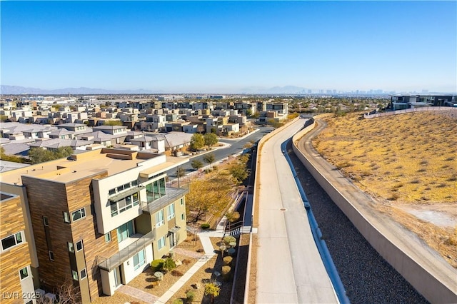 bird's eye view with a mountain view