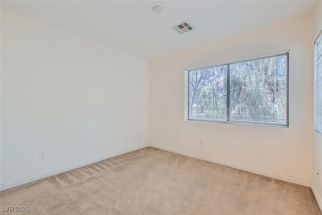 empty room with light carpet