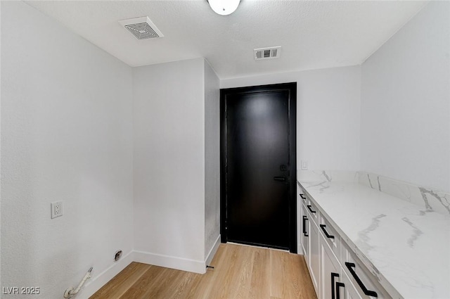 interior space with light hardwood / wood-style flooring