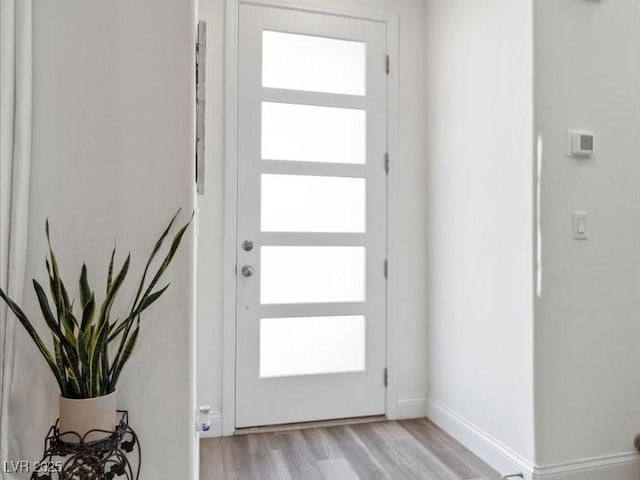 doorway featuring light wood-type flooring