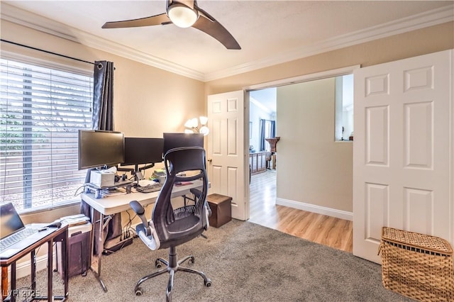 office space featuring crown molding, light hardwood / wood-style floors, and ceiling fan