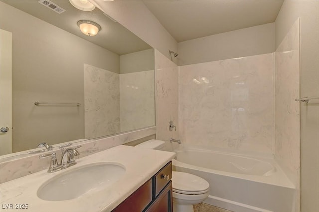 full bathroom featuring toilet, vanity, and bathtub / shower combination