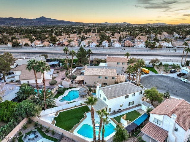 drone / aerial view with a mountain view and a residential view