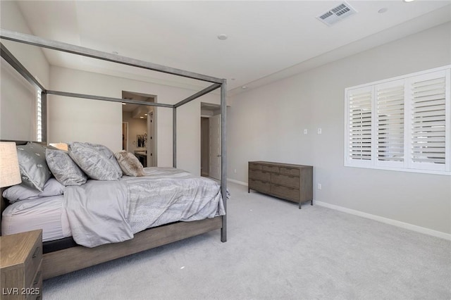 bedroom with light carpet