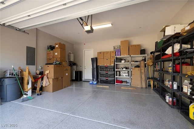 garage featuring a garage door opener and electric panel