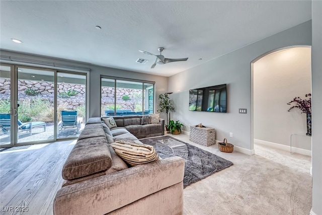 living room featuring ceiling fan