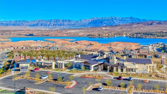 bird's eye view featuring a water and mountain view