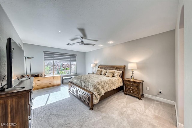 carpeted bedroom featuring ceiling fan