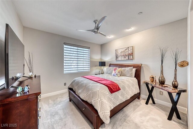 bedroom featuring light carpet and ceiling fan