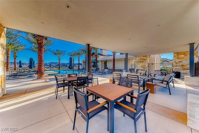 view of patio with a community pool