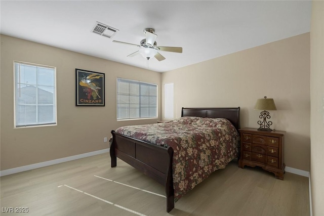 bedroom featuring light hardwood / wood-style floors and ceiling fan