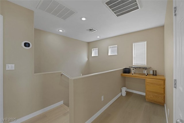 hallway featuring light wood-type flooring