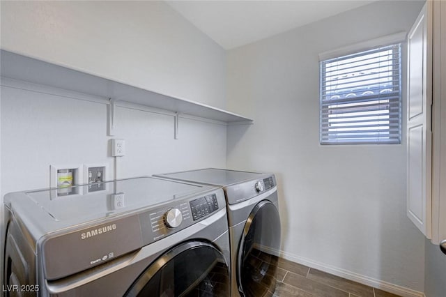 laundry room featuring separate washer and dryer